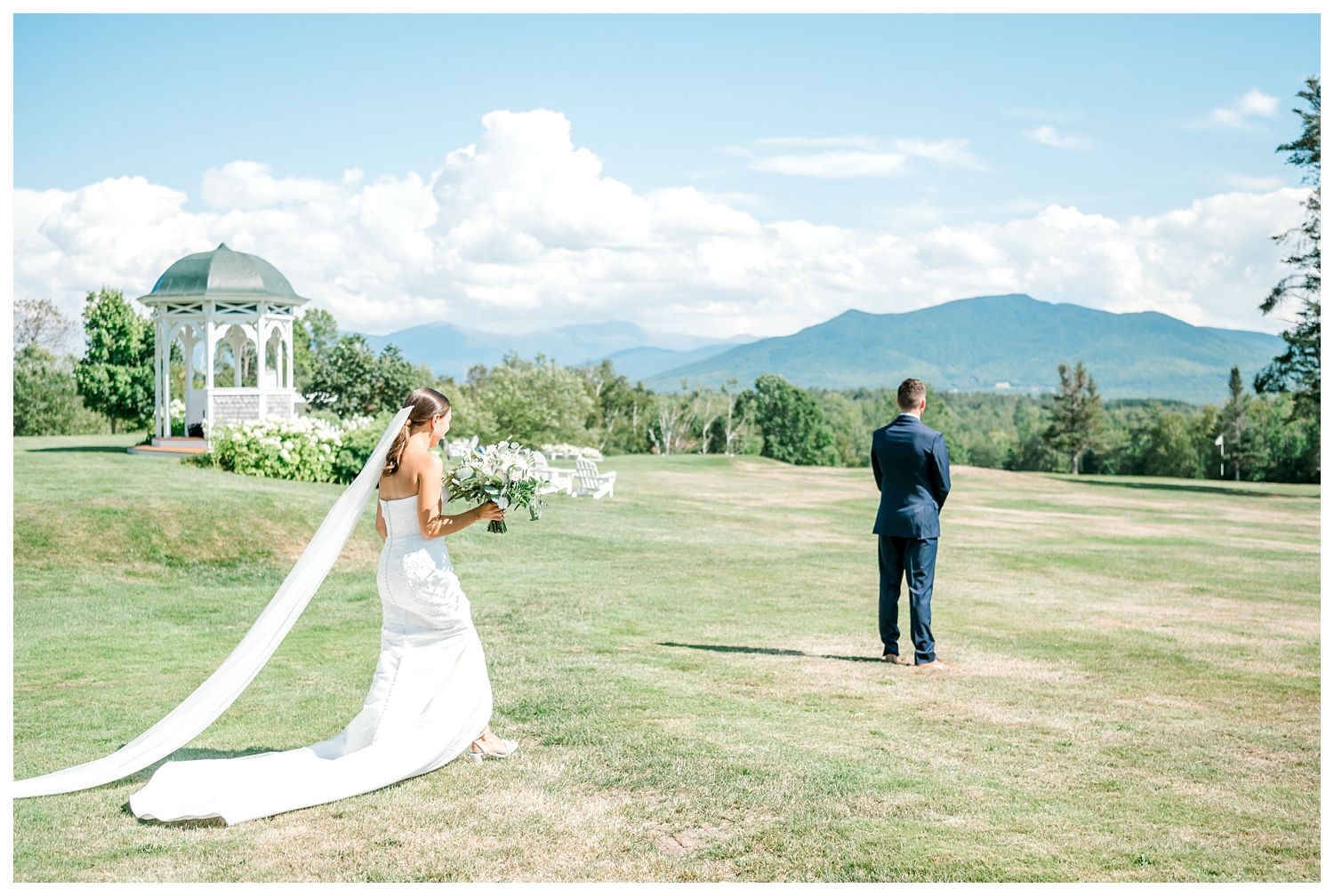 wedding first look with mountains in the back